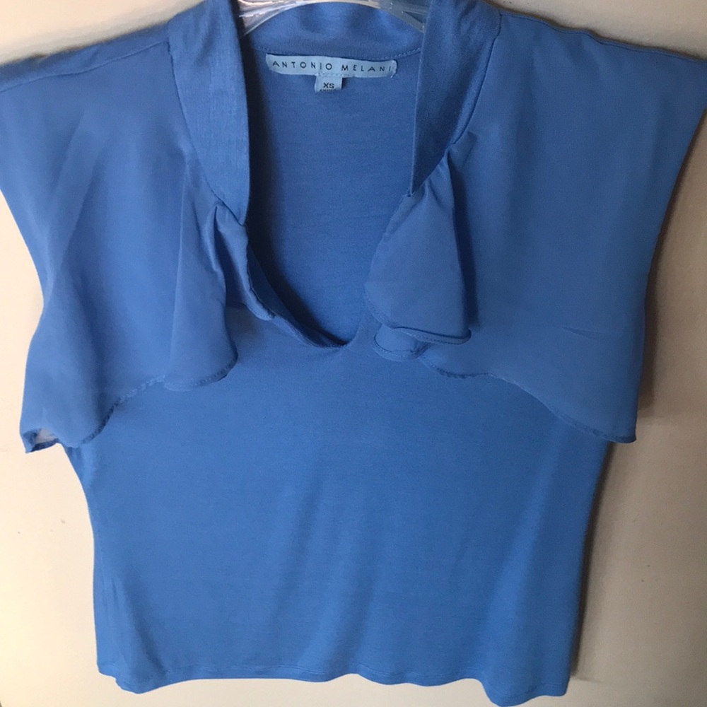 Blue sleeveless top size Csoka